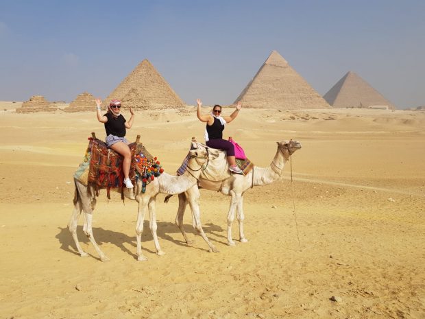 Go to the pyramids of Giza 
