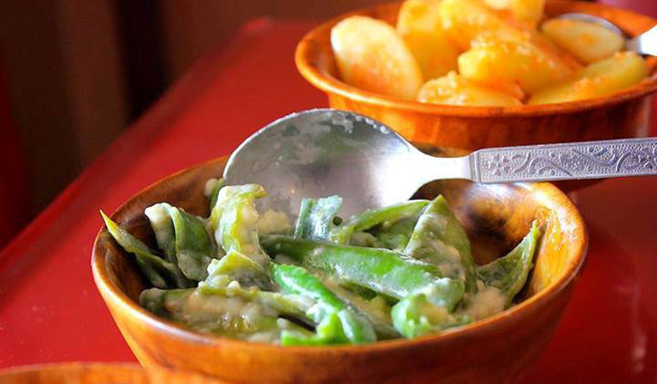 Bhutan’s unofficial national dish, ema datshi, or cheese with green chili. Photo courtesy Wiki.