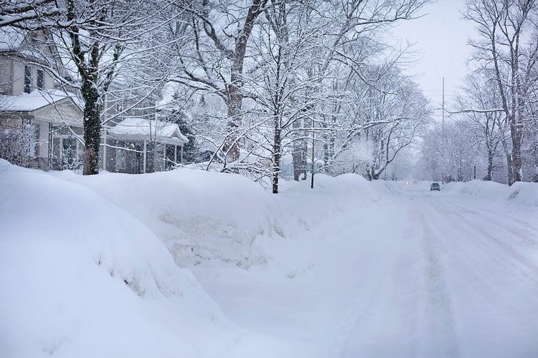 snowy suburban street scene